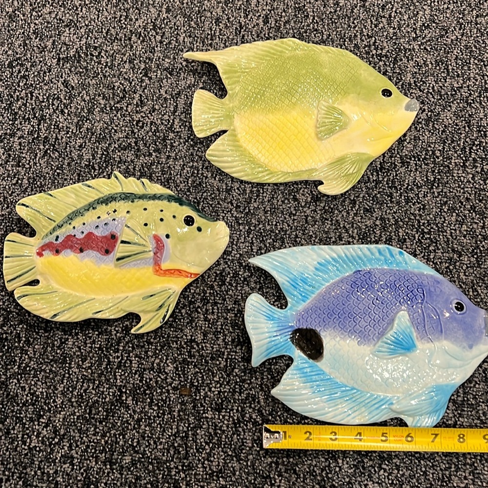 Three. Decorative ceramic fish.